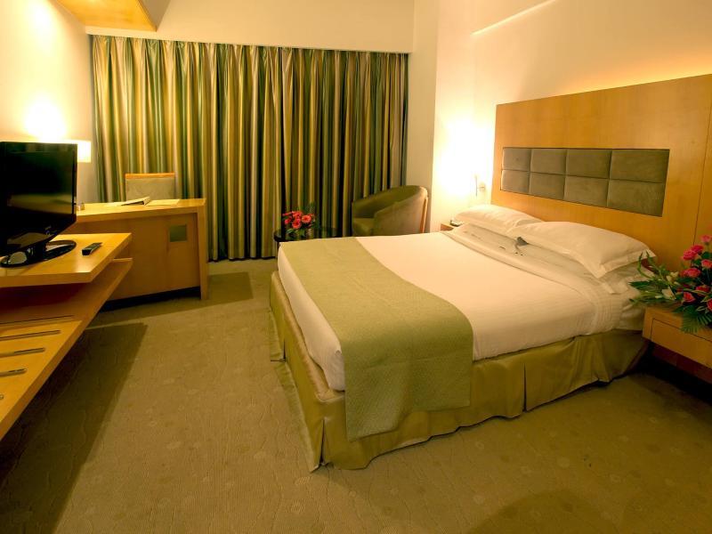 Peninsula Grand Hotel Мумбай Стая снимка