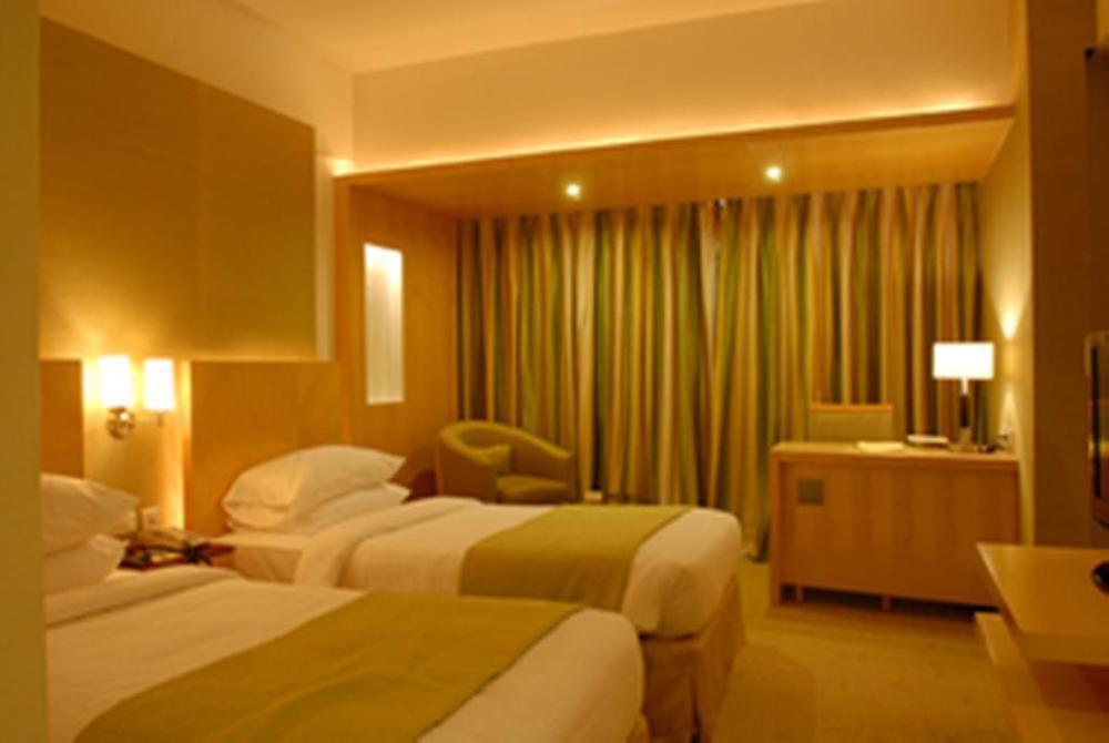 Peninsula Grand Hotel Мумбай Стая снимка