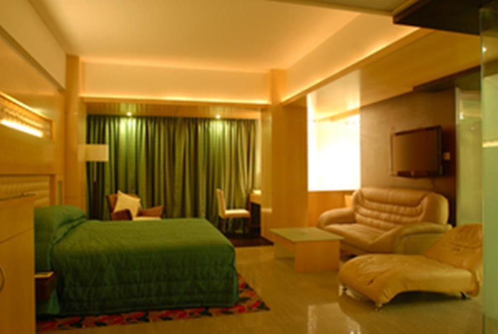 Peninsula Grand Hotel Мумбай Стая снимка